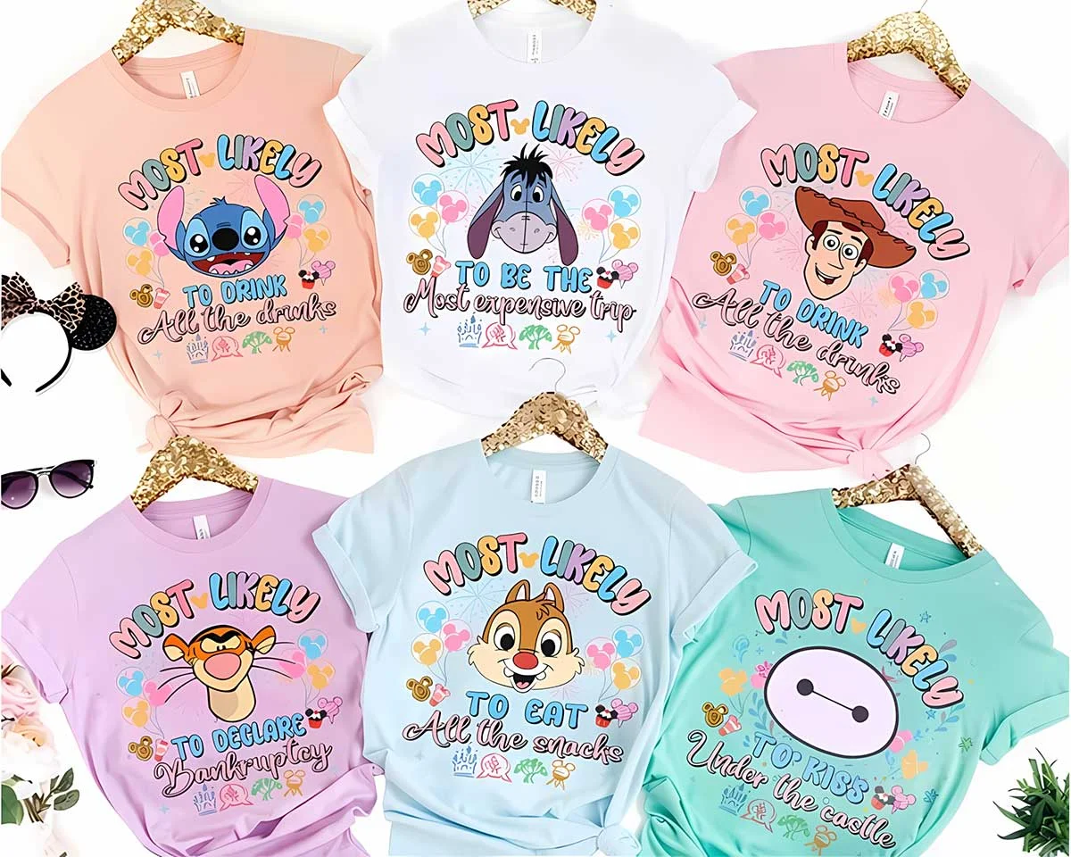 Personalized Disney Trip Most Likely To Family Vacation Tees 4 Personalized Disney Trip Most Likely To Family Vacation Tees in pastel colors group flat lay with glitter hangers