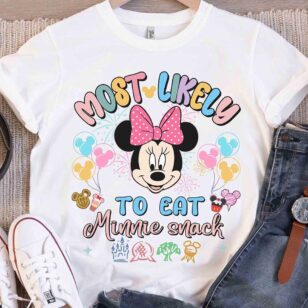 Personalized Disney Trip Most Likely To Family Vacation Tees 12 White Minnie Mouse Most Likely To Eat Minnie Snack Disney park vacation t-shirt flat lay with denim and headphones
