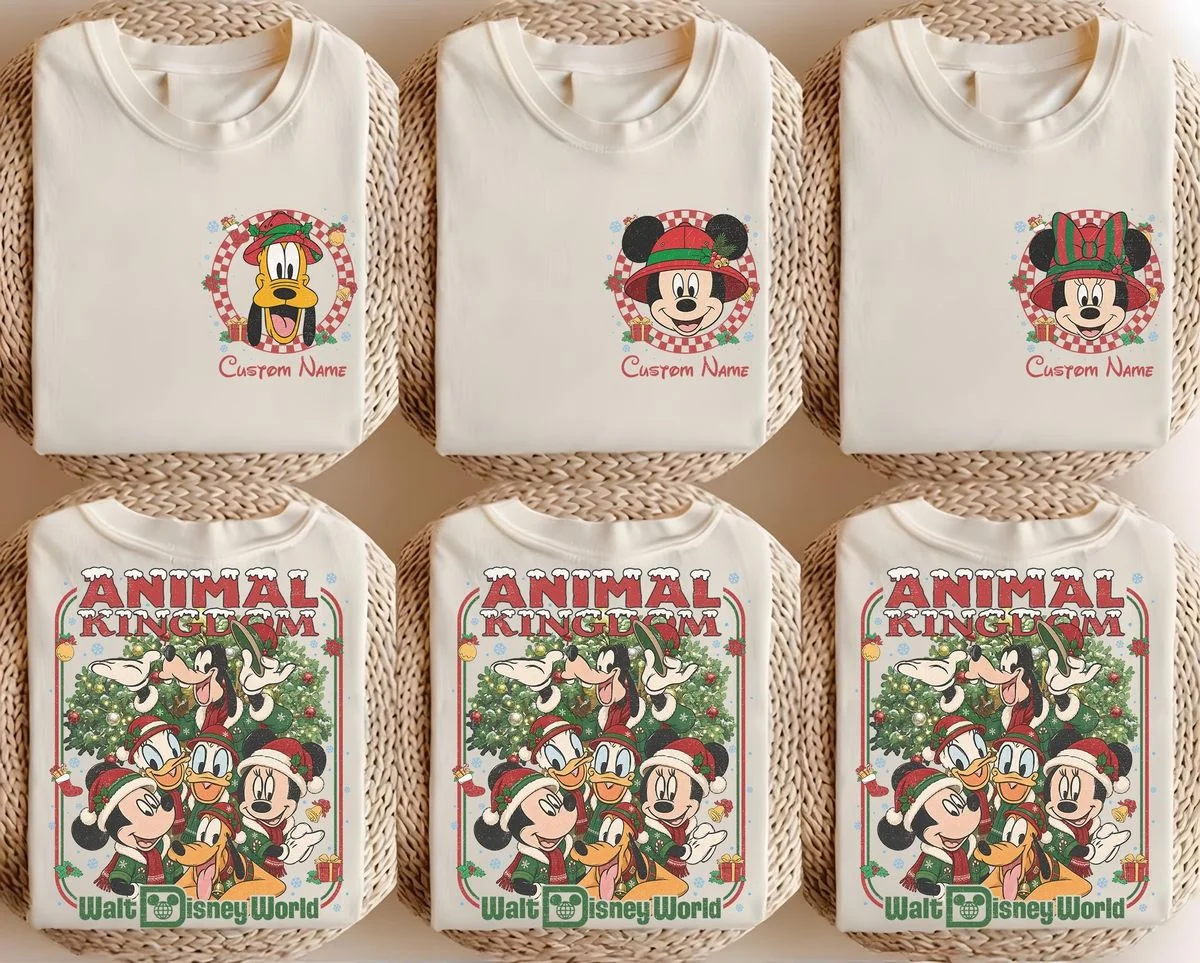 2 Sided Animal Kingdom Christmas Shirt with Safari Pocket and Back 2 family wearing 2 sided disney animal kingdom christmas shirt in front of Tree of Life