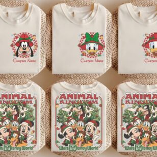 2 Sided Animal Kingdom Christmas Shirt with Safari Pocket and Back 10 family wearing 2 sided disney animal kingdom christmas shirt in front of Tree of Life