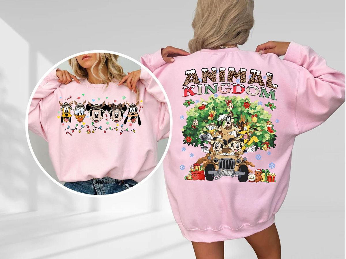 Mickey Friends Animal Kingdom Christmas Sweatshirt with Safari Jeep Art, Rocking Holiday Joy 16 mickey friends animal kingdom christmas sweatshirt in light pink fleece crewneck featuring snow leopard letters and safari jeep