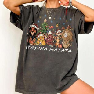hakuna matata christmas tee in pepper vintage washed black showing colorful lion king friends holiday lights artwork