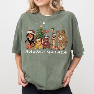 comfort colors lion king christmas shirt in bay sage green worn with leggings for animal kingdom safari expedition