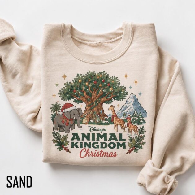 Vintage Animal Kingdom Christmas Sweatshirt For Cozy Park Days, Storybook Art 14 Vintage animal kingdom christmas sweatshirt in sand color featuring watercolor storybook elephant and Tree of Life