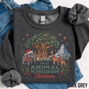 Vintage Animal Kingdom Christmas Sweatshirt For Cozy Park Days, Storybook Art 9 Close up watercolor artwork on elephant holiday shirt showing baby elephant and giraffe wearing winter scarves