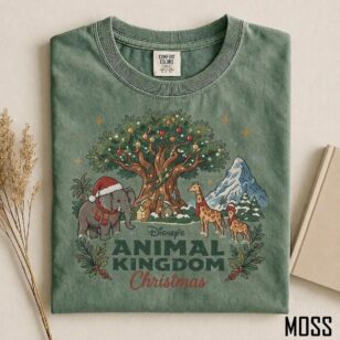 Vintage Animal Kingdom Christmas Sweatshirt For Cozy Park Days, Storybook Art 7 Park visitor wearing vintage animal kingdom christmas sweatshirt holding warm drink in Harambe Village
