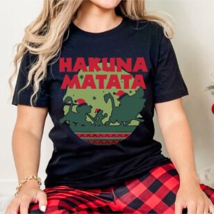 Lion King Hakuna Matata Christmas Sweatshirt with Nordic Art 12 Female model standing indoors wearing black short-sleeve t-shirt with circular Fair Isle Lion King holiday graphic