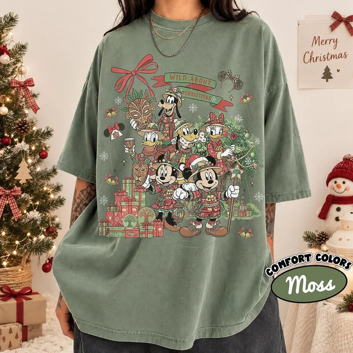 Vintage Wild About Christmas Safari Shirt Iconic Plaid Squad, Comfort Colors Disney Holiday Shirt 4 vintage wild about christmas safari shirt in Comfort Colors moss green worn by female model