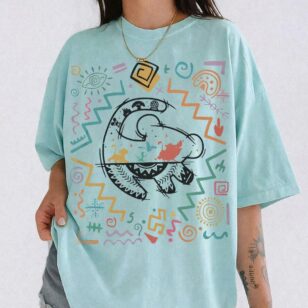 Chalky mint blue 90s Vintage Lion King Tribal Safari Shirt for Disney Animal Kingdom in oversized Comfort Colors fit for summer safari trips